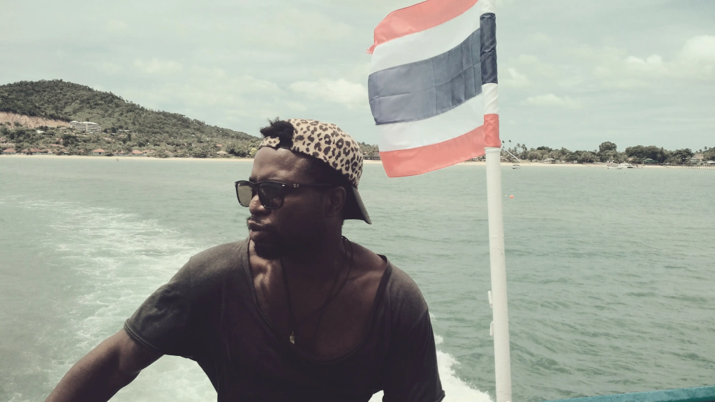 awrence Aderinkomi, founder of Xeno National, personifying the brand's personal, bespoke travel design approach.